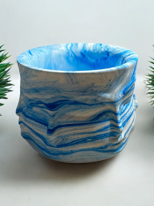 Vaso decorativo con volti
