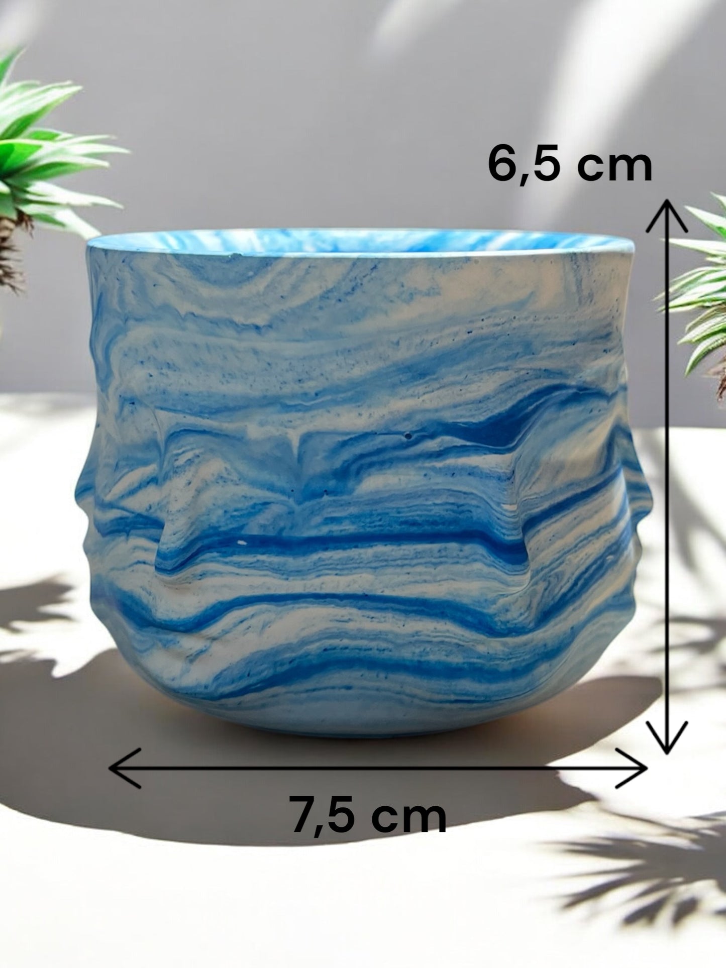 Vaso decorativo con volti